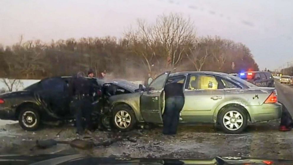 PHOTO: People respond to the scene of the crash.