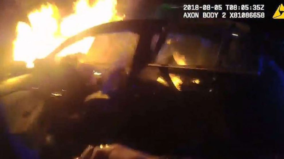 Atlanta police officers pulled a passenger out of a burning vehicle on Sunday, Aug. 5, 2018.