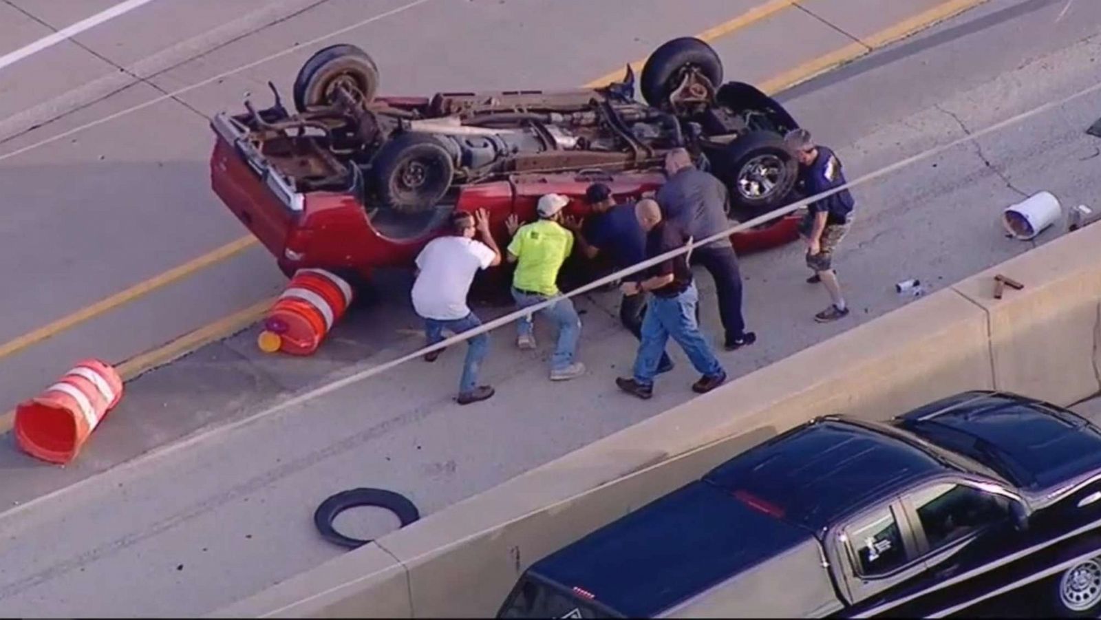 Good Samaritans flip overturned truck on Illinois highway to rescue driver, video shows News