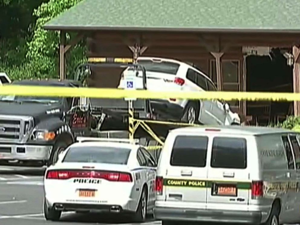 PHOTO: This frame grab from video shows an SUV being towed from the scene where authorities say Roger Self rammed his vehicle into a busy restaurant, Sunday, May 20, 2018, killing his daughter and another person in Bessemer City, N.C.