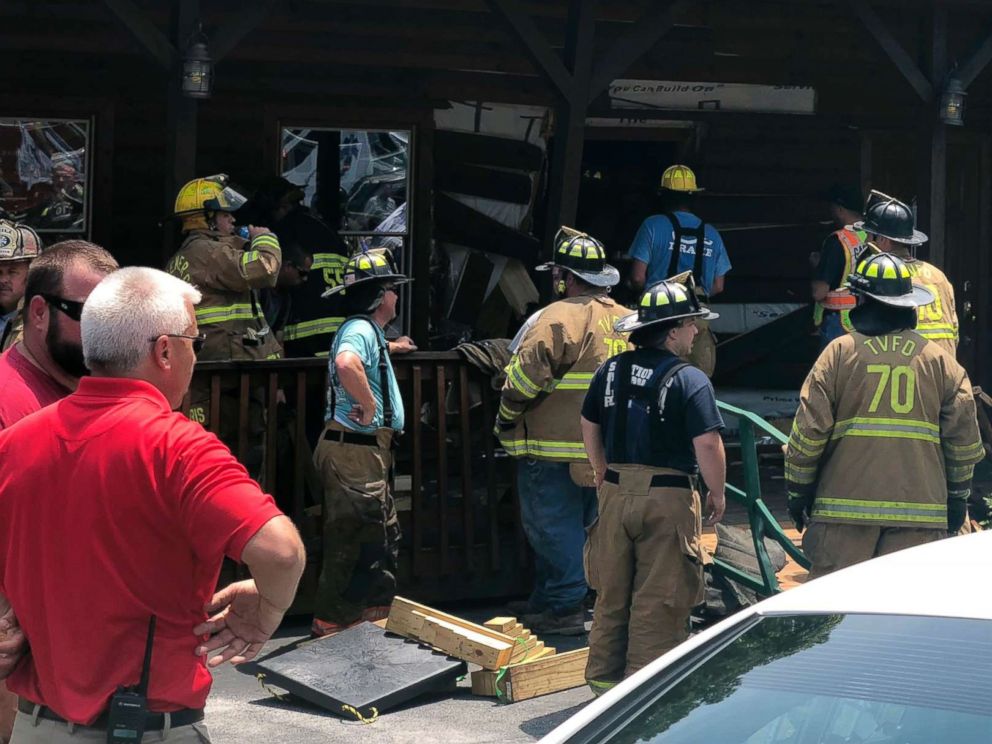 PHOTO: Authorities work the scene of a restaurant where police say a man intentionally rammed a vehicle into the steak and seafood eatery shortly after midday Sunday, May 20, 2018, in Bessemer City, N.C.