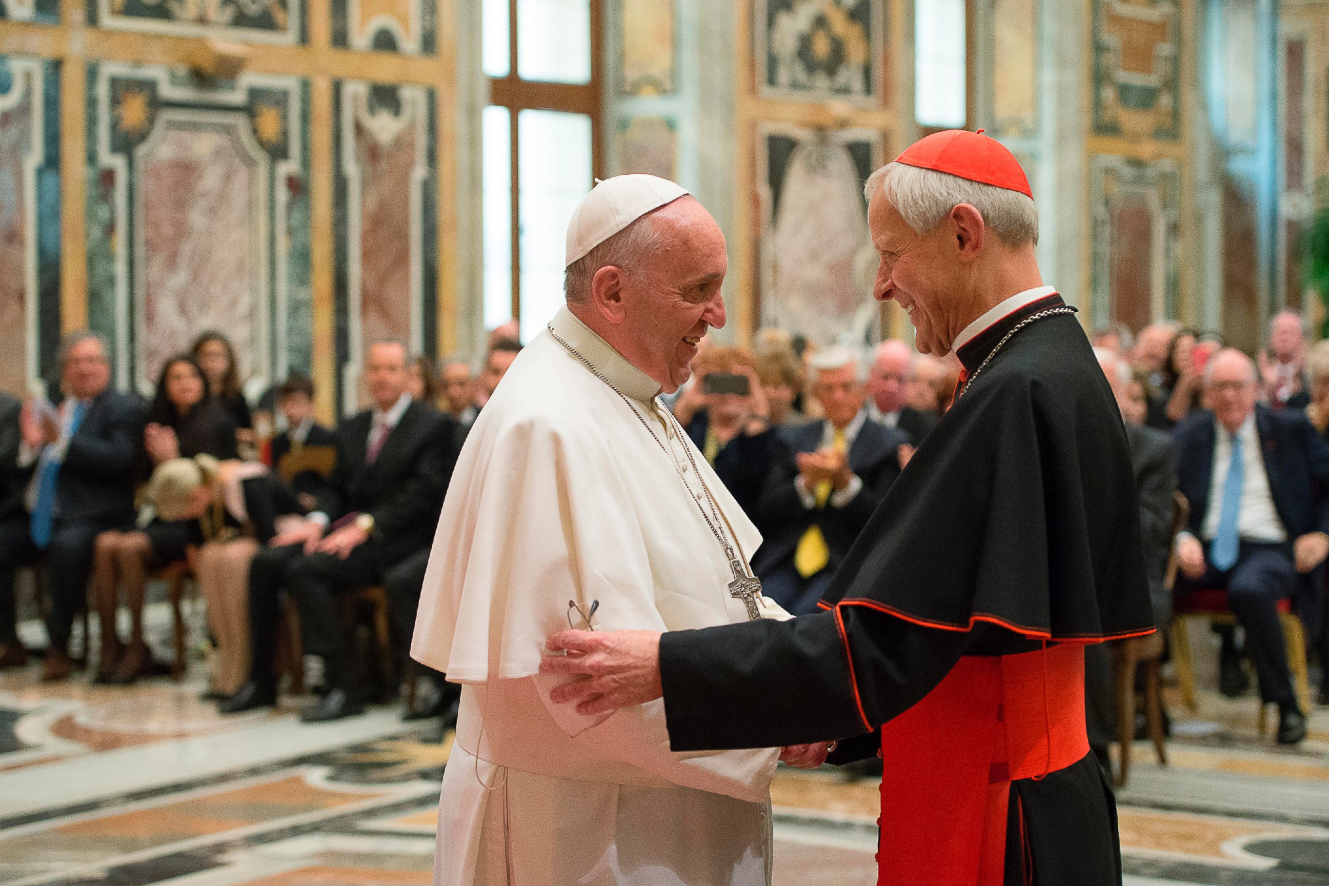 In this Wednesday, Oct. 20, 2010 file photo, Pope Francis, left, talks with Papal Foundation Chairman Cardinal Donald Wuerl, Archbishop of Washinghton, D.C., during a meeting with members of the Papal Foundation at the Vatican.