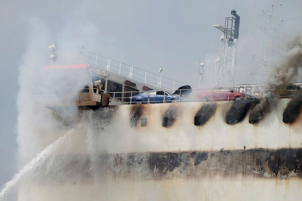 PHOTO: Emergency personnel battle against a fire aboard the Italian-flagged Grande Costa d'Avorio cargo ship at the Port of Newark, July 7, 2023, in Newark, N.J.