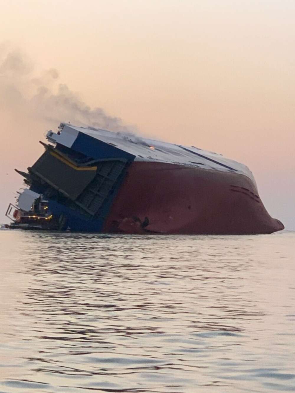 PHOTO: A cargo ship caught fire and overturned in the St. Simons Sound off Brunswick, Ga., Sept. 8, 2019.