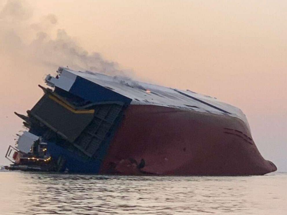 Rescuers searching for 4 crew members after 650foot cargo ship catches