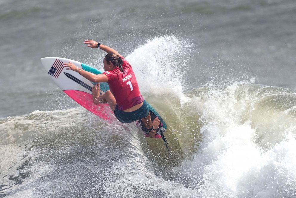 PHOTO: Carissa Moore, of the United States, maneuvers on a wave during third round of women's surfing competition at the 2020 Summer Olympics, July 26, 2021, at Tsurigasaki beach in Ichinomiya, Japan.