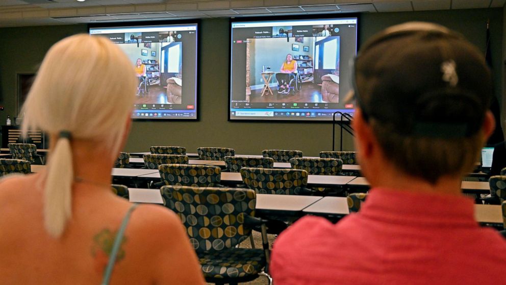 PHOTO: Members of the public watch testimony during the zoom broadcast of the Michael Carneal parole hearing at the West Kentucky Community and Technical College in Paducah, Ky., Sept. 19, 2022.