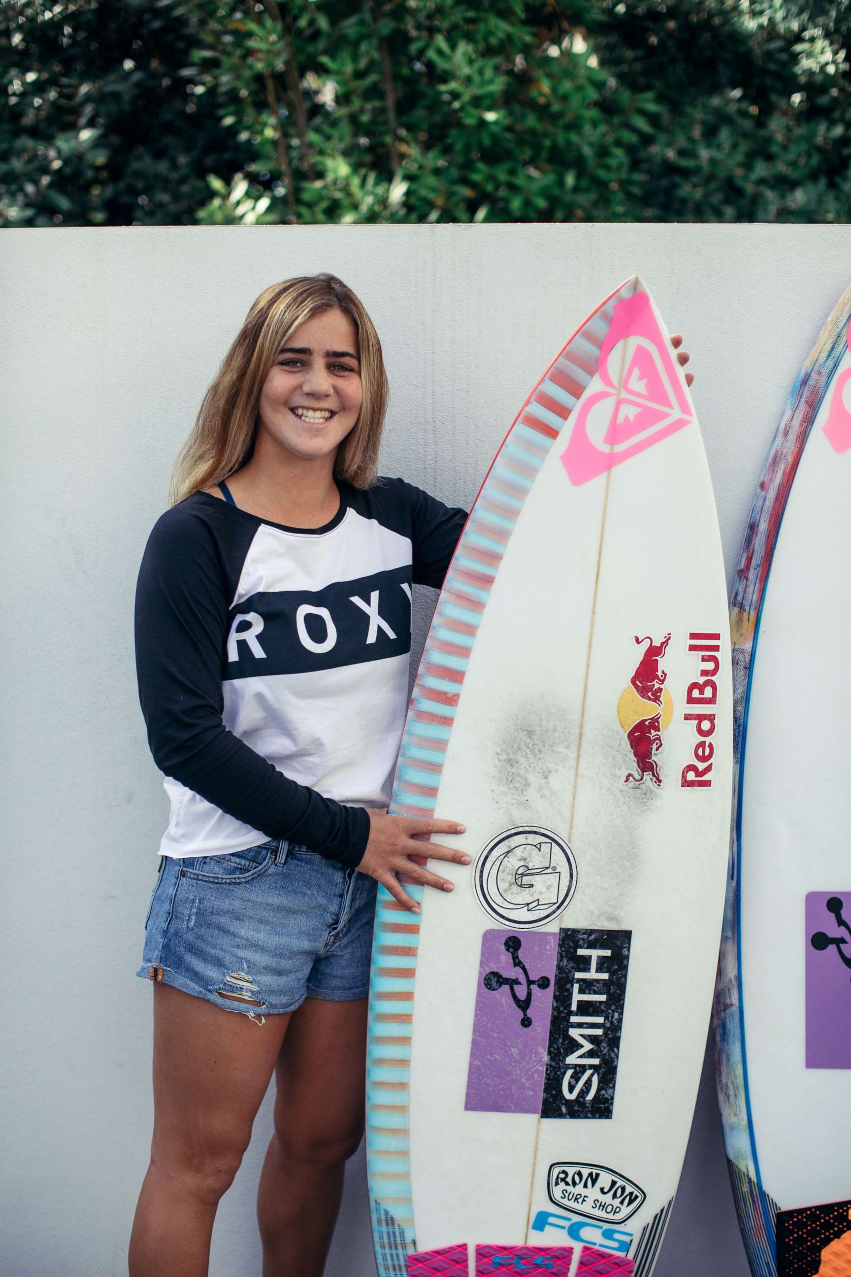 PHOTO: Caroline Marks with her Roxy surfboard. 