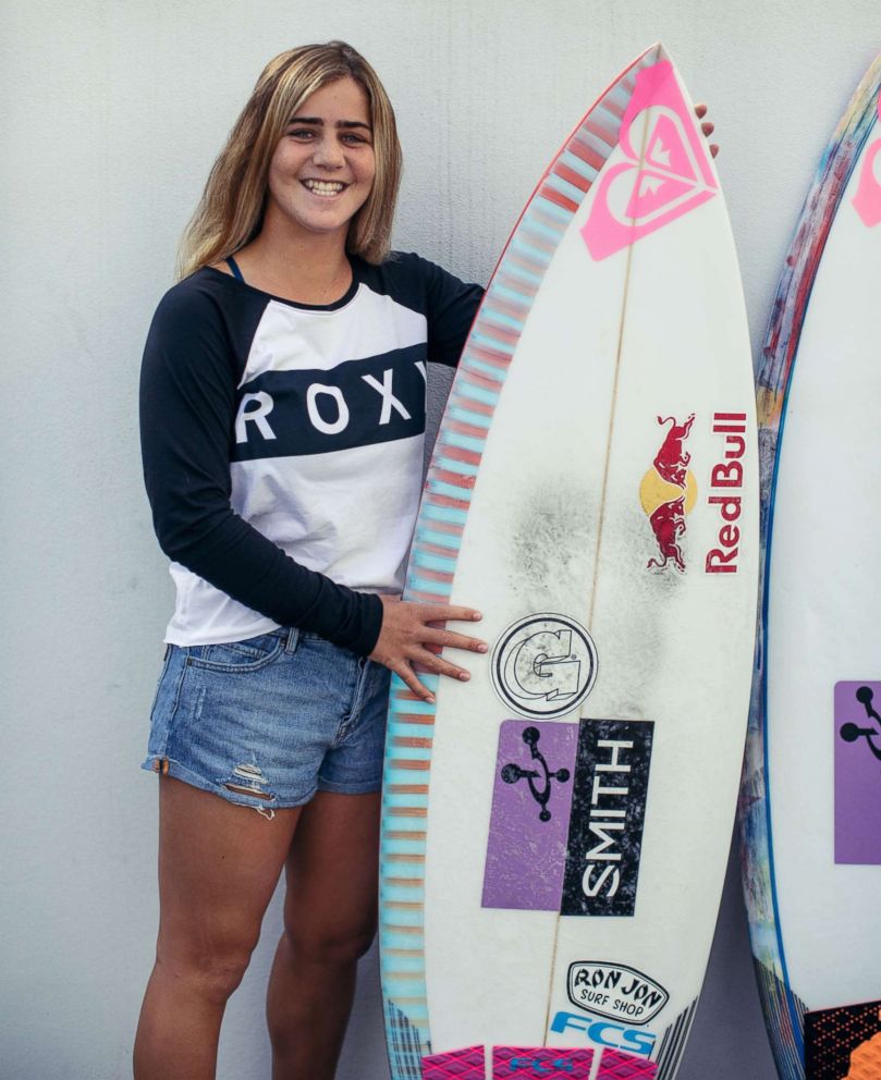 PHOTO: Caroline Marks with her Roxy surfboard. 