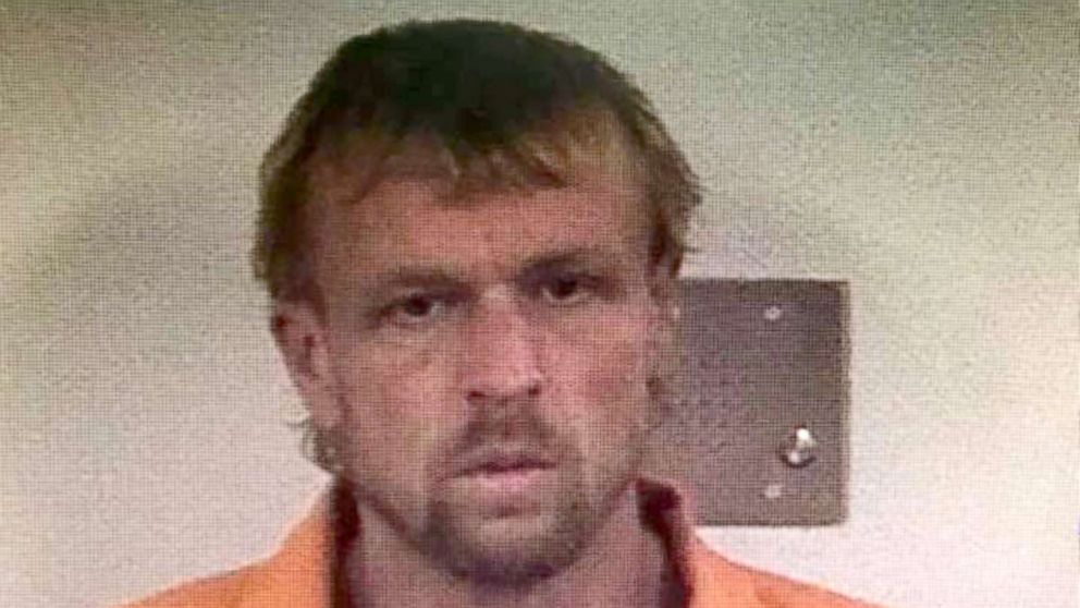 Inmate on the run after breaking through shower wall to escape