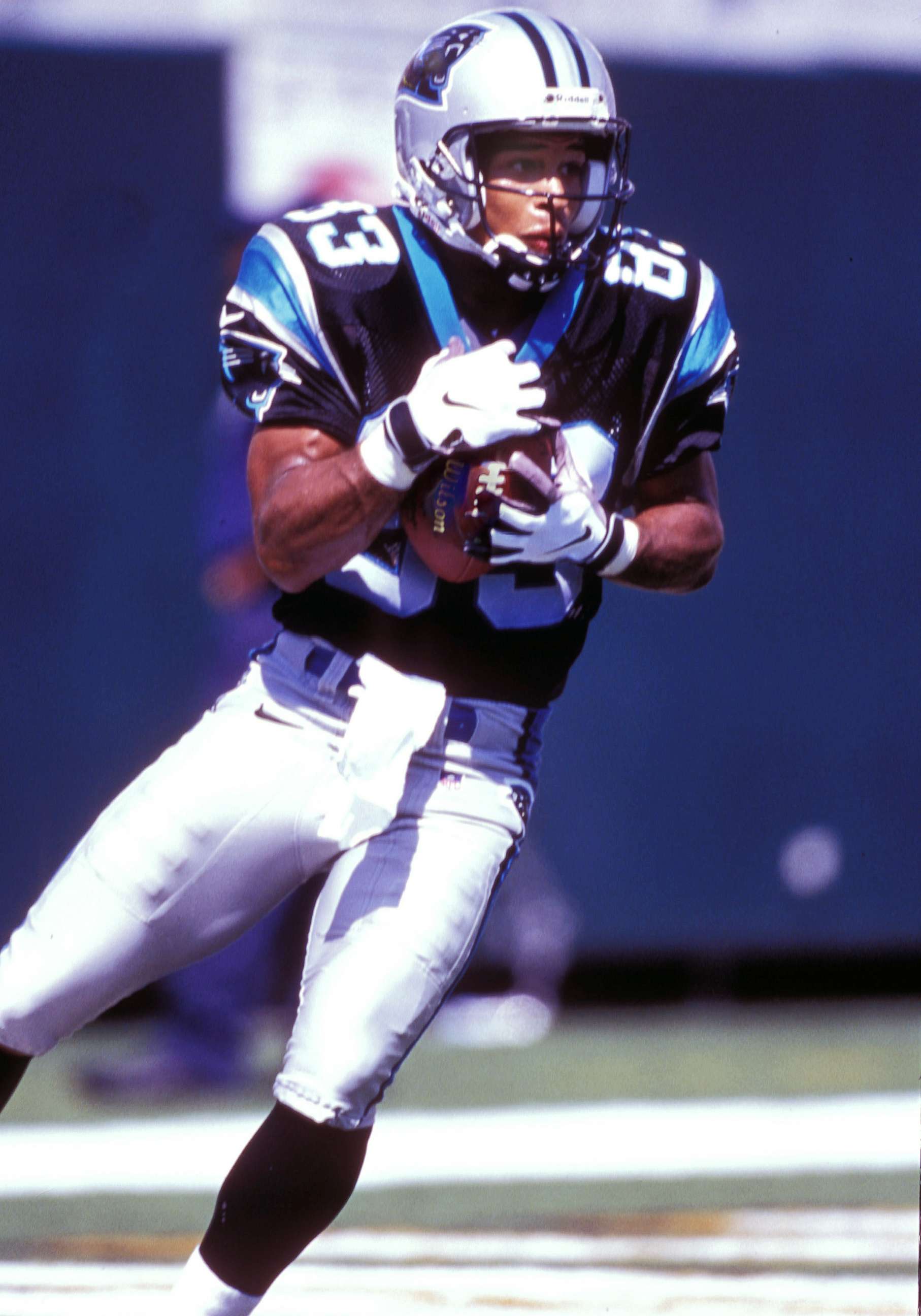 PHOTO: Carolina Panthers wide receiver Rae Carruth (83) catches a punt during an NFL football game in 1998. 