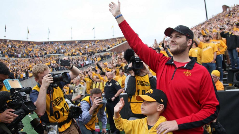 PHOTO: Carson King of Altoona, Iowa, waves to patients in the University of Iowa Stead Family Children's Hospital at the end of the first quarter of the game  between the Iowa Hawkeyes and Middle Tennessee Blue Raiders Sept. 28, 2019, in Iowa City, Iowa.