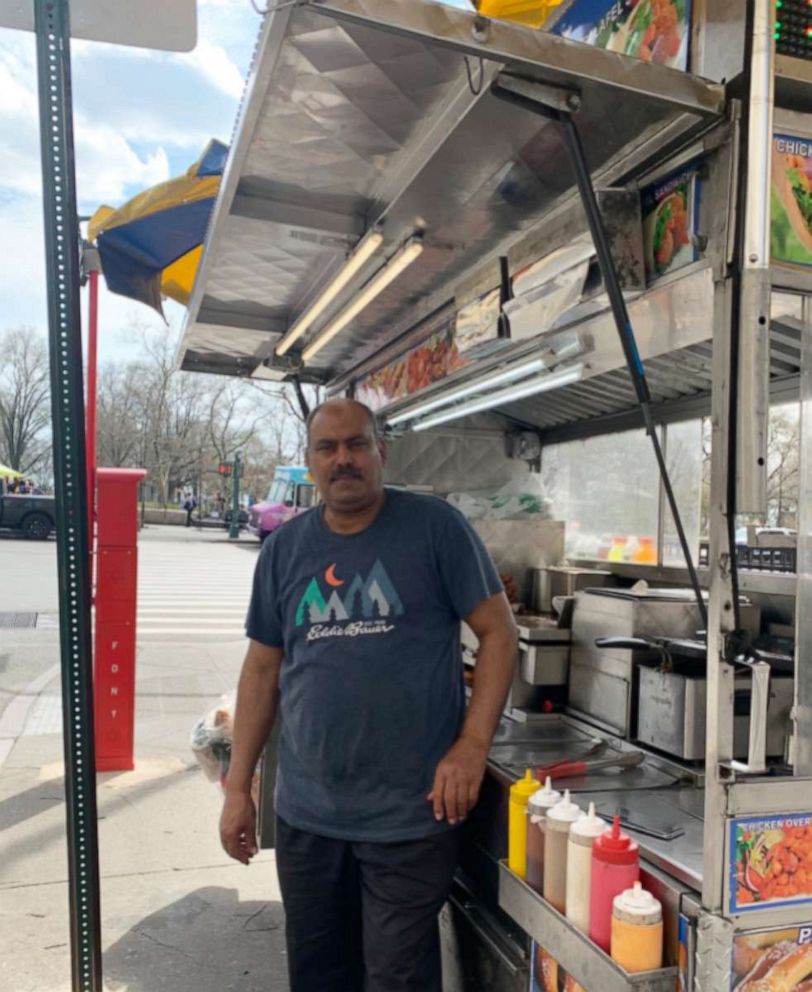 PHOTO: Eraky Badawy, 58, who immigrated from Egypt in 1999, has worked at his Halal cart off Battery Park for over 20 years.