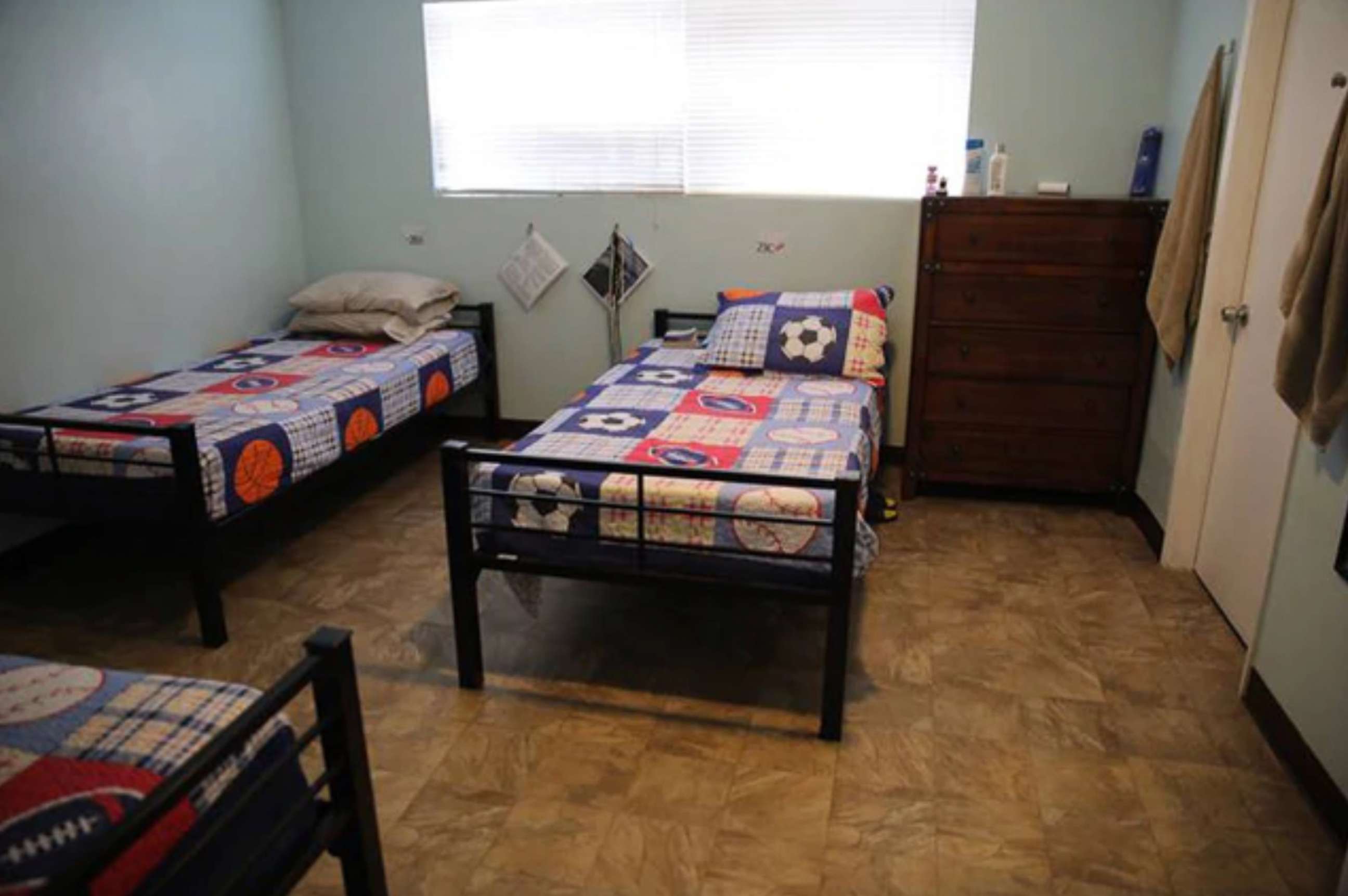 PHOTO: An undated photograph released by the Department of Health and Human Services shows a bedroom inside a facility that houses unaccompanied migrant children crossing the U.S. border from Mexico at Casa San Diego in El Cajon, outside San Diego, Calif.
