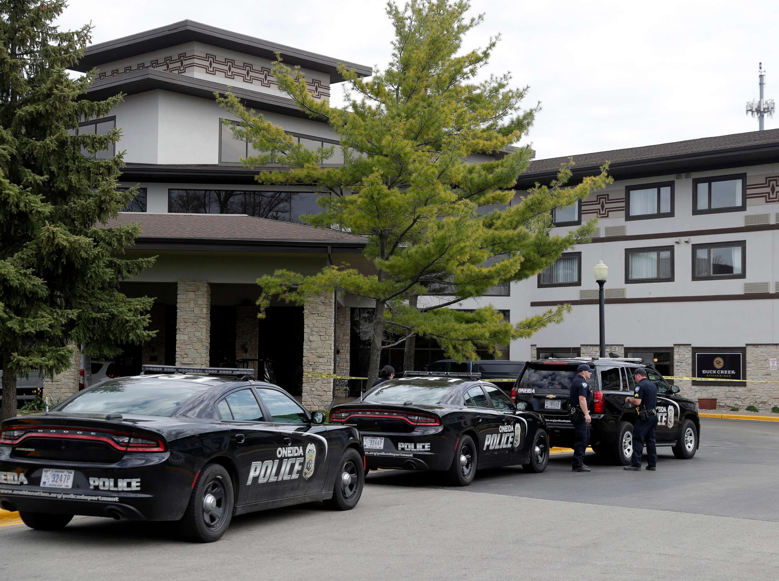PHOTO: Oneida police officers gather outside the Oneida Casino/Radisson Hotel & Conference Center on Sunday morning, May 2, 2021, after a shooting Ashwaubenon, Wis.