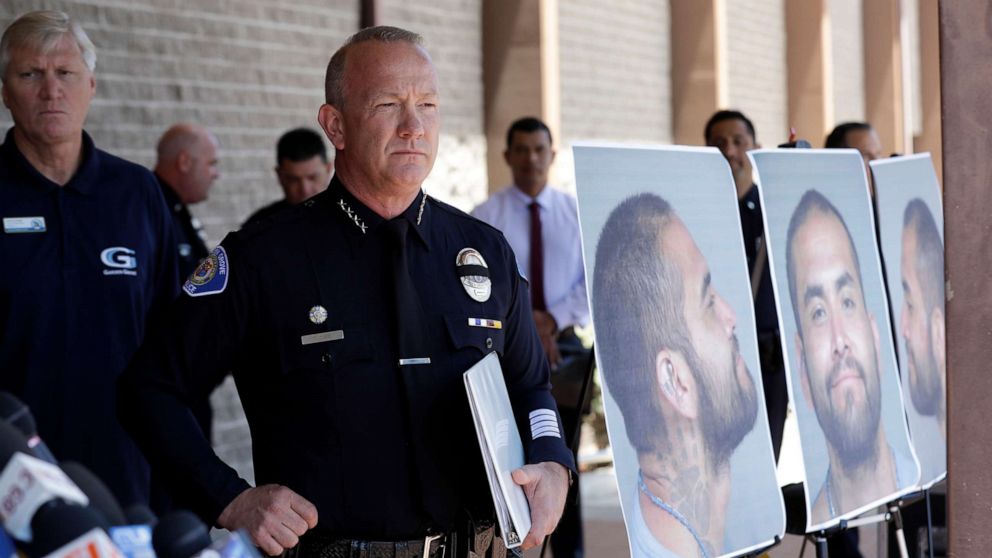 PHOTO: Garden Grove Police Chief Tom DaRe prepares to address the media next to a booking mug shot of Zachary Castaneda posted outside of the Garden Grove Police Department headquarters in Garden Grove, Calif., Aug. 8, 2019.