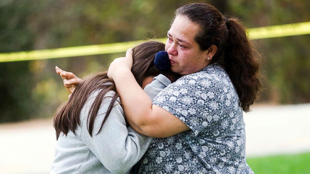 PHOTO: Maria Ortiz consoles her 5th-grade daughter, Crystal Godinez, after she was released from evacuation at Castle View Elementary School in Riverside, Calif., Oct. 31, 2017.