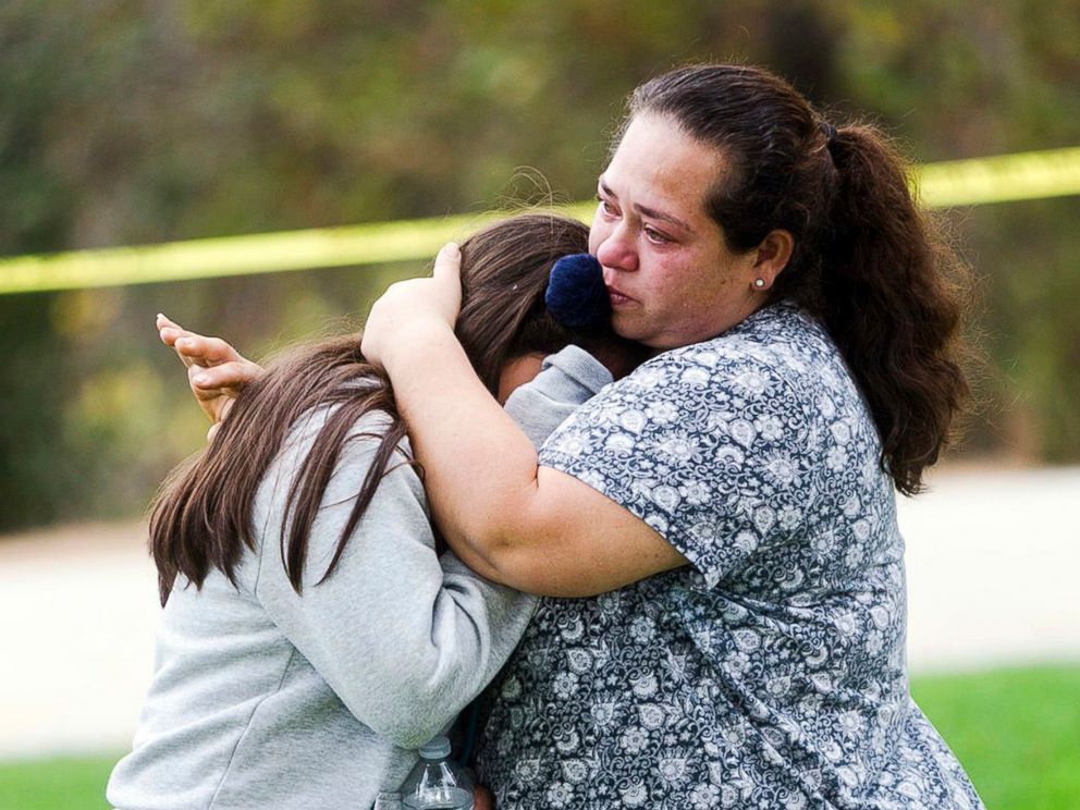 PHOTO: Maria Ortiz consoles her 5th-grade daughter, Crystal Godinez, after she was released from evacuation at Castle View Elementary School in Riverside, Calif., Oct. 31, 2017.