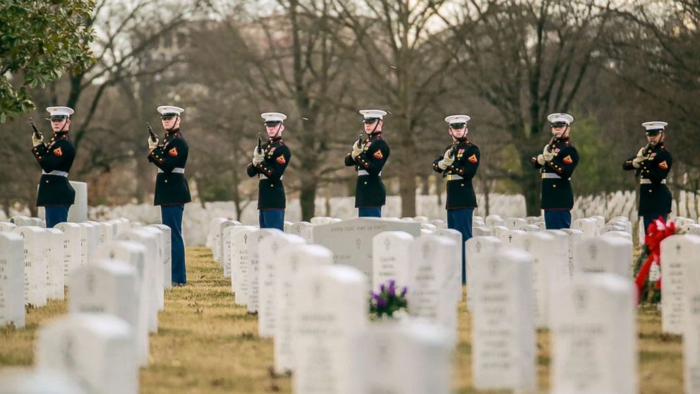 Marines with the Alpha Company firing party render a three-volley salute during a funeral for Master Sgt. Catherine G. Murray, ret., at Arlington National Cemetery, Va., Jan. 23, 2018.