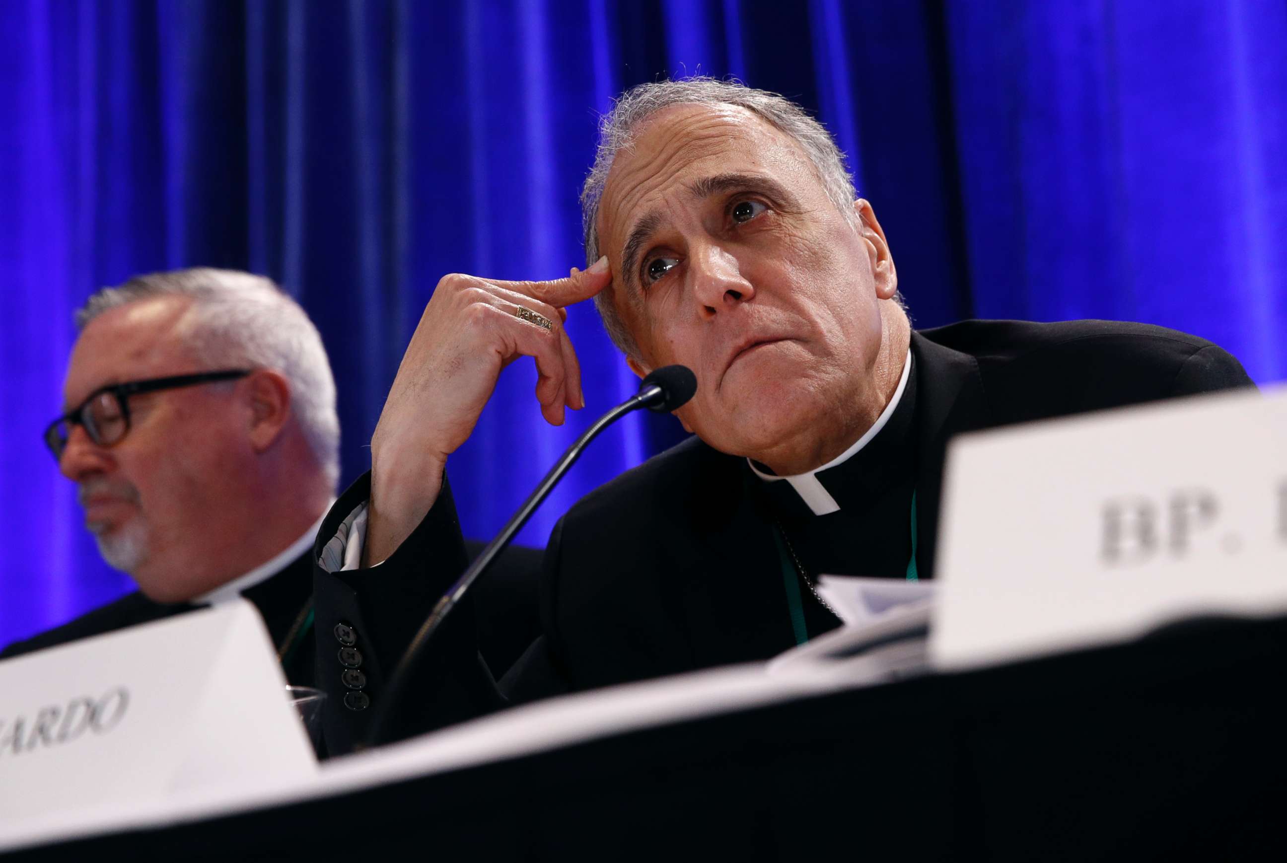 PHOTO: Cardinal Daniel DiNardo, president of the United States Conference of Catholic Bishops, listens to a reporter's question during a news conference during the USCCB's annual fall meeting, Nov. 12, 2018, in Baltimore.