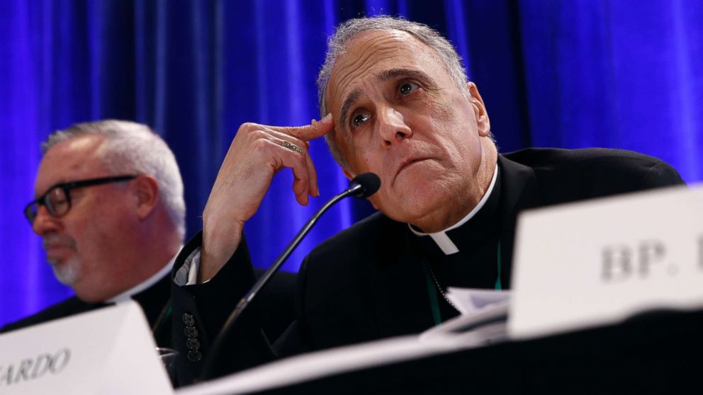 PHOTO: Cardinal Daniel DiNardo, president of the United States Conference of Catholic Bishops, listens to a reporter's question during a news conference during the USCCB's annual fall meeting, Nov. 12, 2018, in Baltimore.