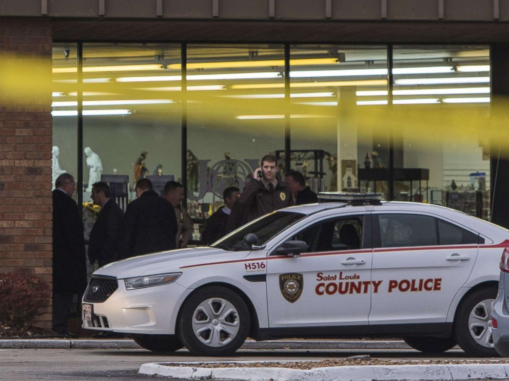 PHOTO: Police investigate the scene of an attack in the St. Louis Catholic Supply Store on November 19, 2018.
