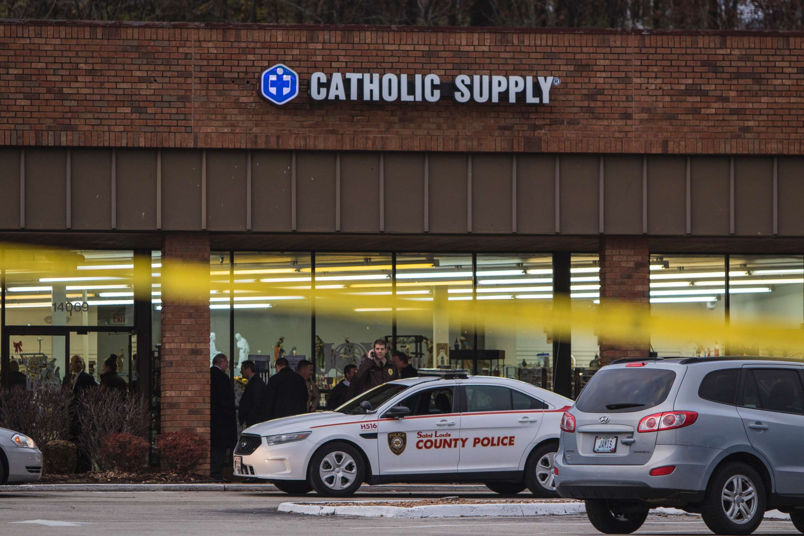 PHOTO: Authorities investigate the scene at a Catholic Supply store where a gunman went into the religious supply store, sexually assaulted at least one woman and shot a woman in the head, Nov. 19, 2018, in Ballwin, Mo.