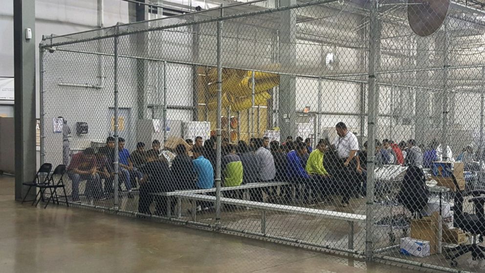 PHOTO: People sit in a cell at the U.S. Customs and Border Protection agency's Rio Grande Valley Centralized Processing Center in McAllen, Texas, June 17, 2018.