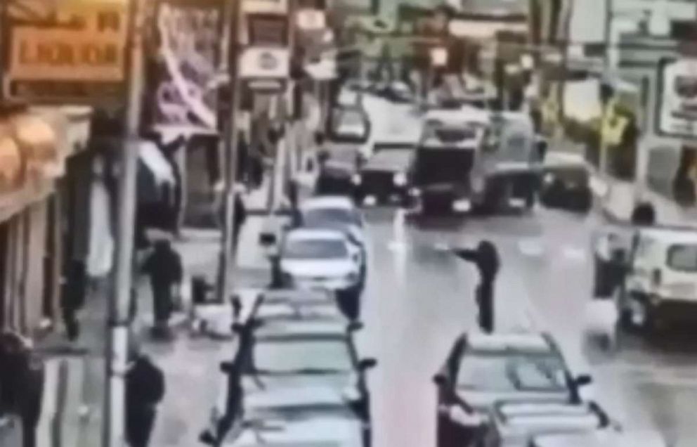 PHOTO: A screen grab from CCTV footage shows two shooters exiting a vehicle and shooting into a store in Jersey City, N.J., Dec. 10, 2019.