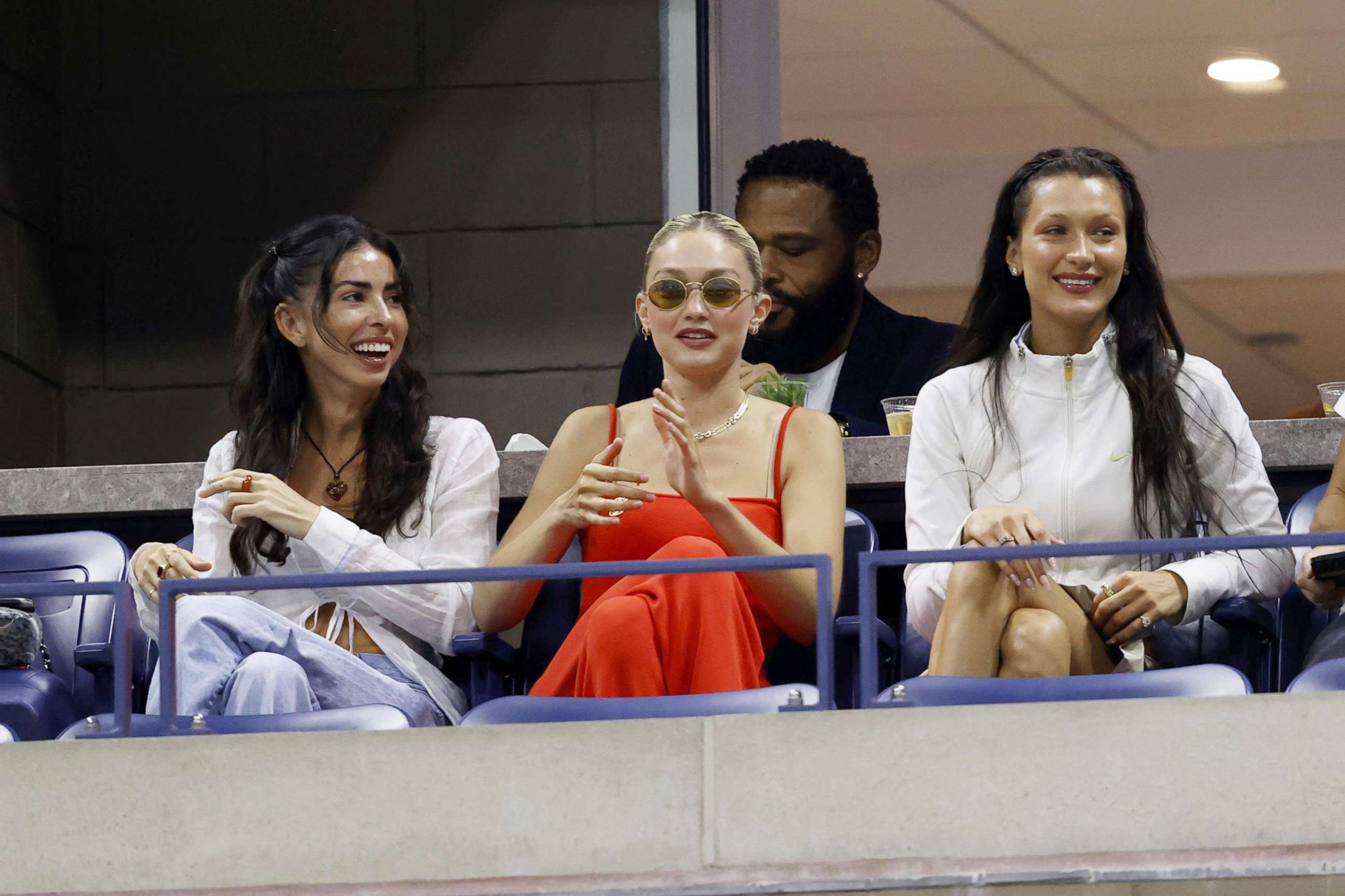 PHOTO: Models Gigi and Bella Hadid (right) watch as Serena Williams plays against Anett Kontaveit during her the first set of her second-round match of the 2022 US Open Tennis Championships in New York, Aug. 31, 2022.
