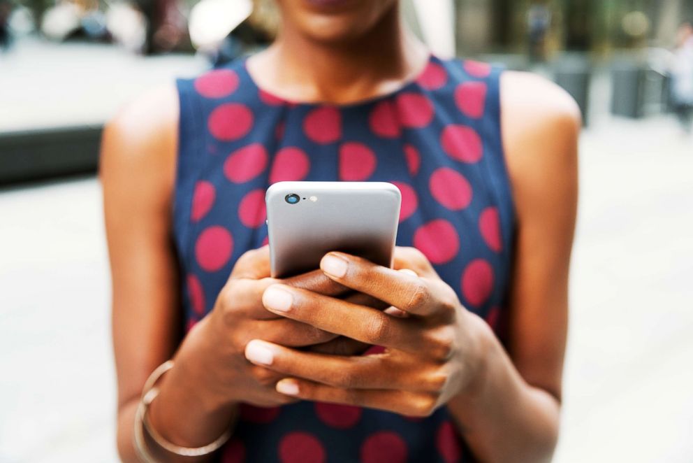 PHOTO: A woman uses a cellphone in this stock image.