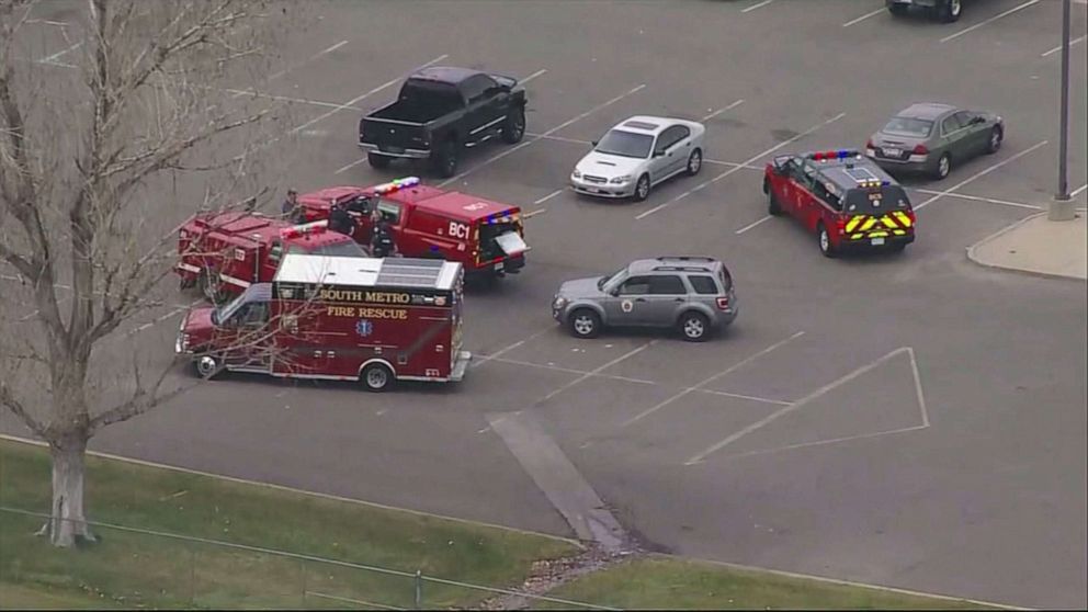 PHOTO: First responders gather in a parking lot near Central High School in Aurora, Colo., Nov. 15, 2021, after reports of a shooting.