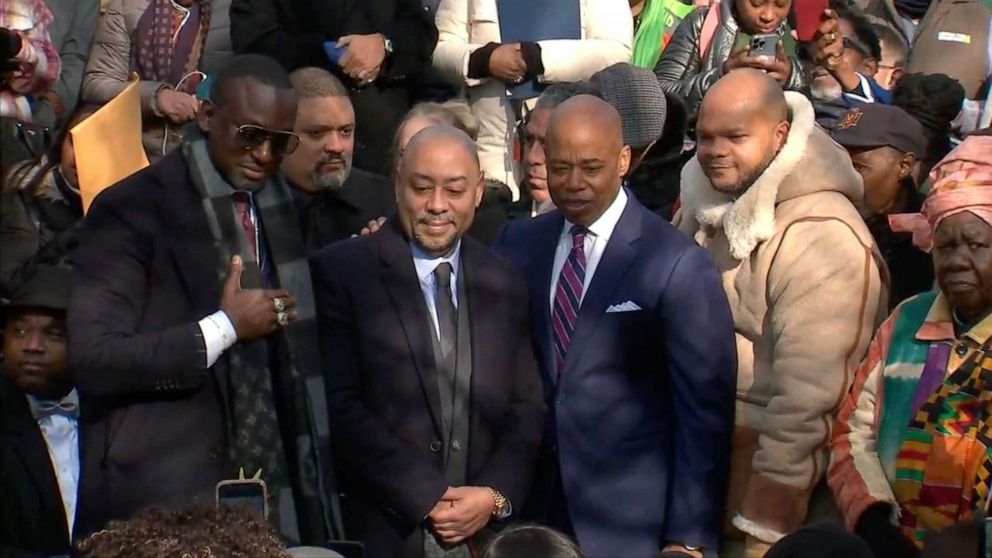 PHOTO: New York Mayor Eric Adams poses with the "Central Park Five" who were exonerated from a criminal case from 1989. One of New York's Central Park entrance was named the "Gate of the Exonerated" honoring the 5 men.