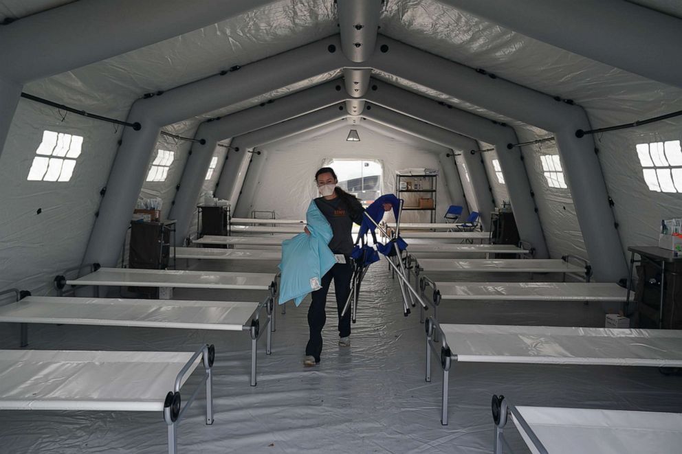 PHOTO: Beds are set up in a tent as volunteers from the International Christian relief organization Samaritans Purse set up an Emergency Field Hospital for patients suffering from the coronavirus in Central Park, March 30, 2020 in New York.