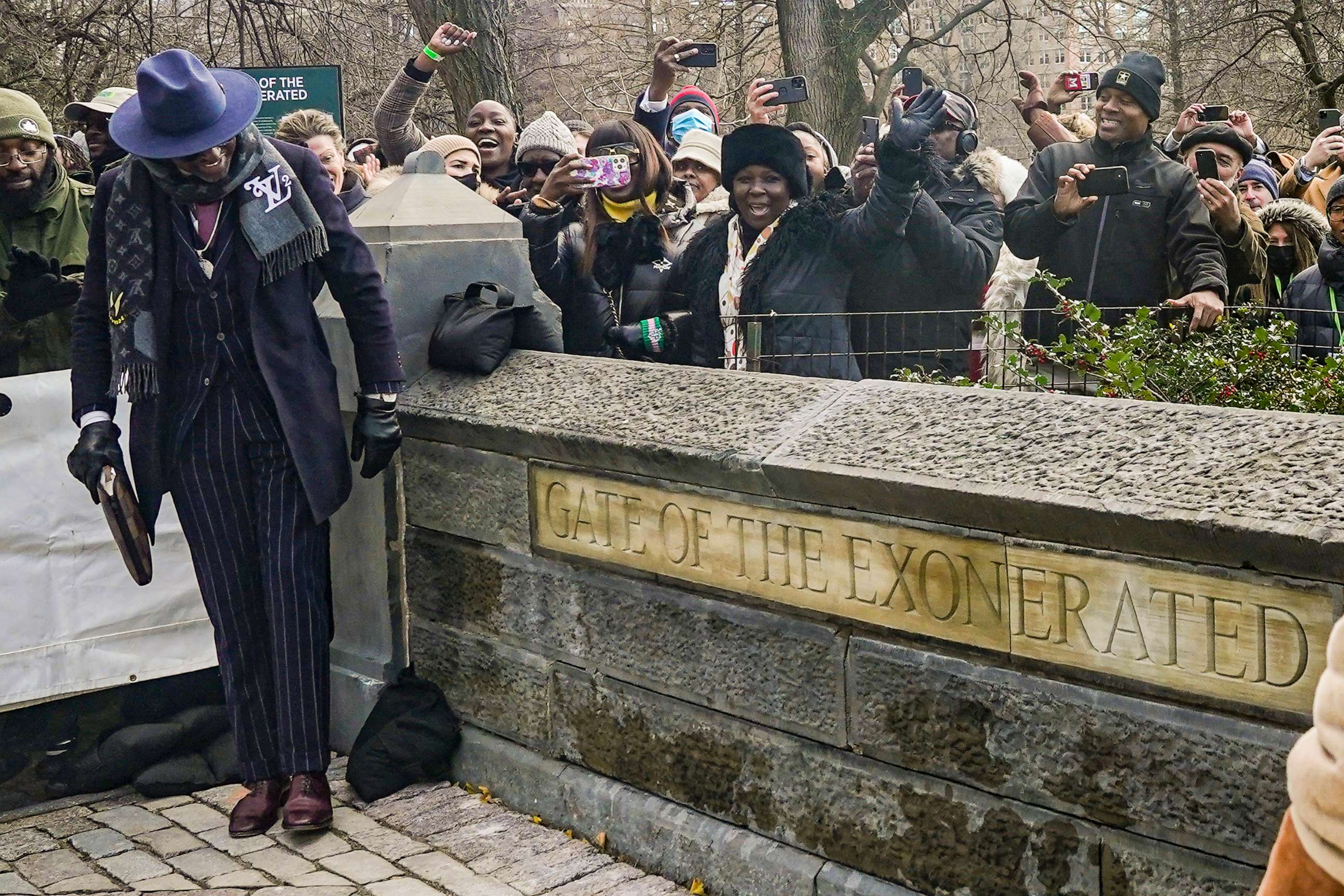 PHOTO: Yusef Salaam, left, one of five men exonerated after being wrongfully convicted for the 1989 rape in Central Park, looks at the plaque "Gate of the Exonerated," unveiled for the northeast gateway of Central Park, Dec. 19, 2022, in New York.