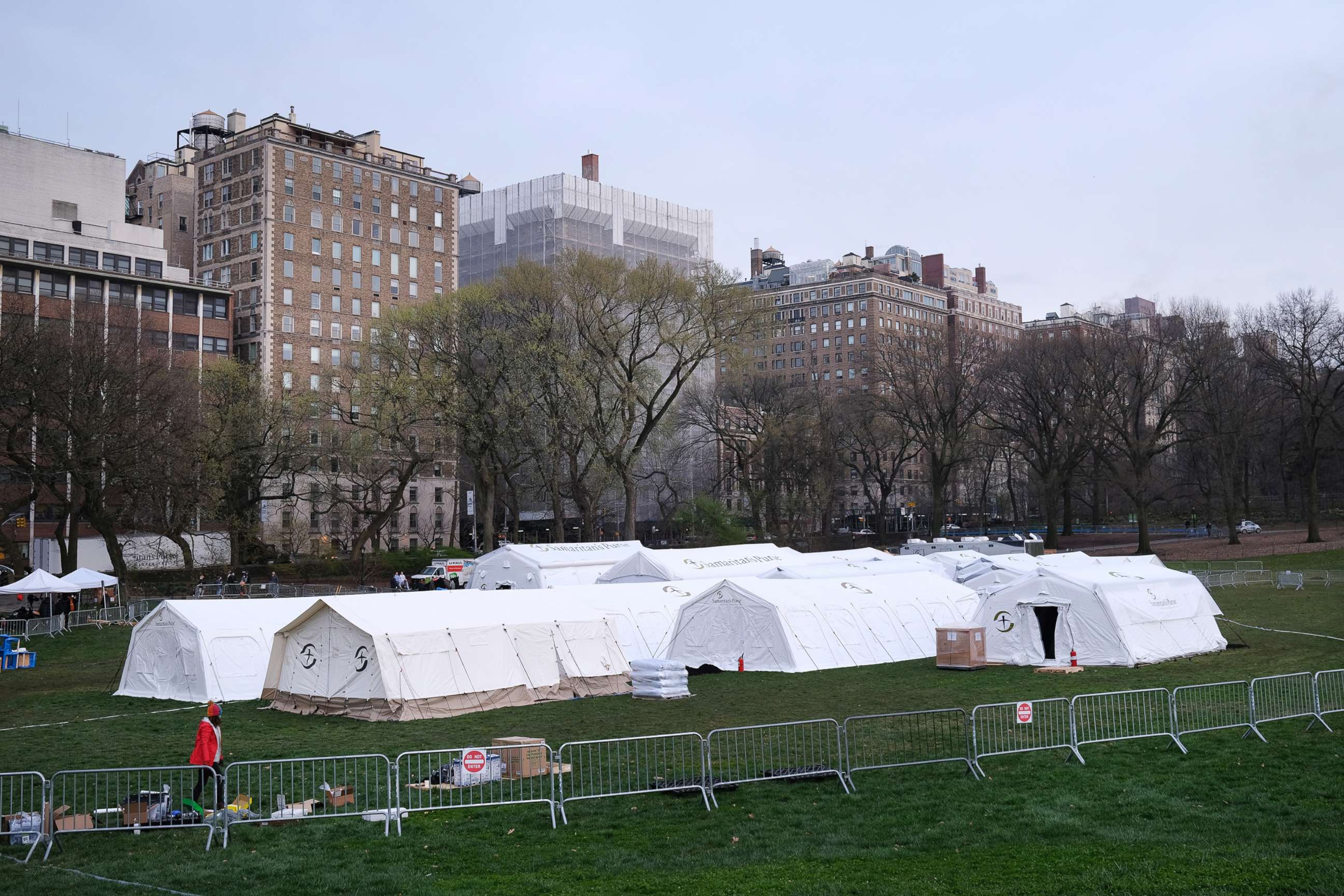 PHOTO: Members of the international Christian humanitarian organization Samaritans's Purse, put the finishing touches on a field hospital in New York's Central Park, March 30, 2020 in New York City.