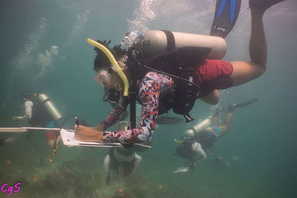 PHOTO: DWP divers document their findings.