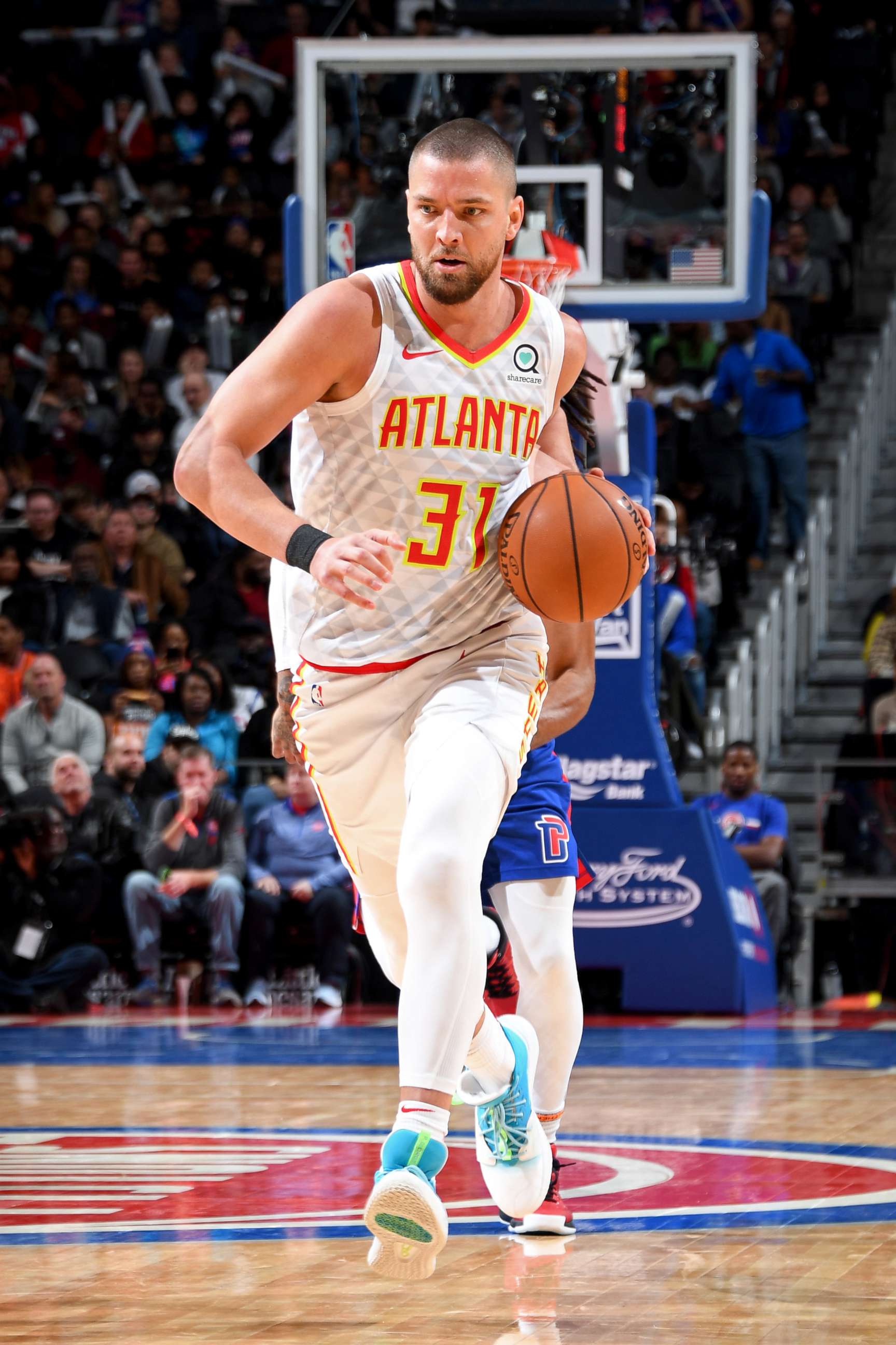 PHOTO: Chandler Parsons, #31 of the Atlanta Hawks, drives to the basket against the Detroit Pistons, Nov. 22, 2019, at Little Caesars Arena in Detroit.