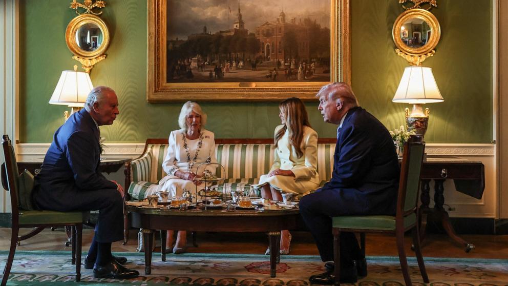 PHOTO: President Donald Trump and first lady Melania Trump host Britain's King Charles and Queen Camilla for afternoon tea on the South Lawn of the White House in Washington, April 27, 2026. 