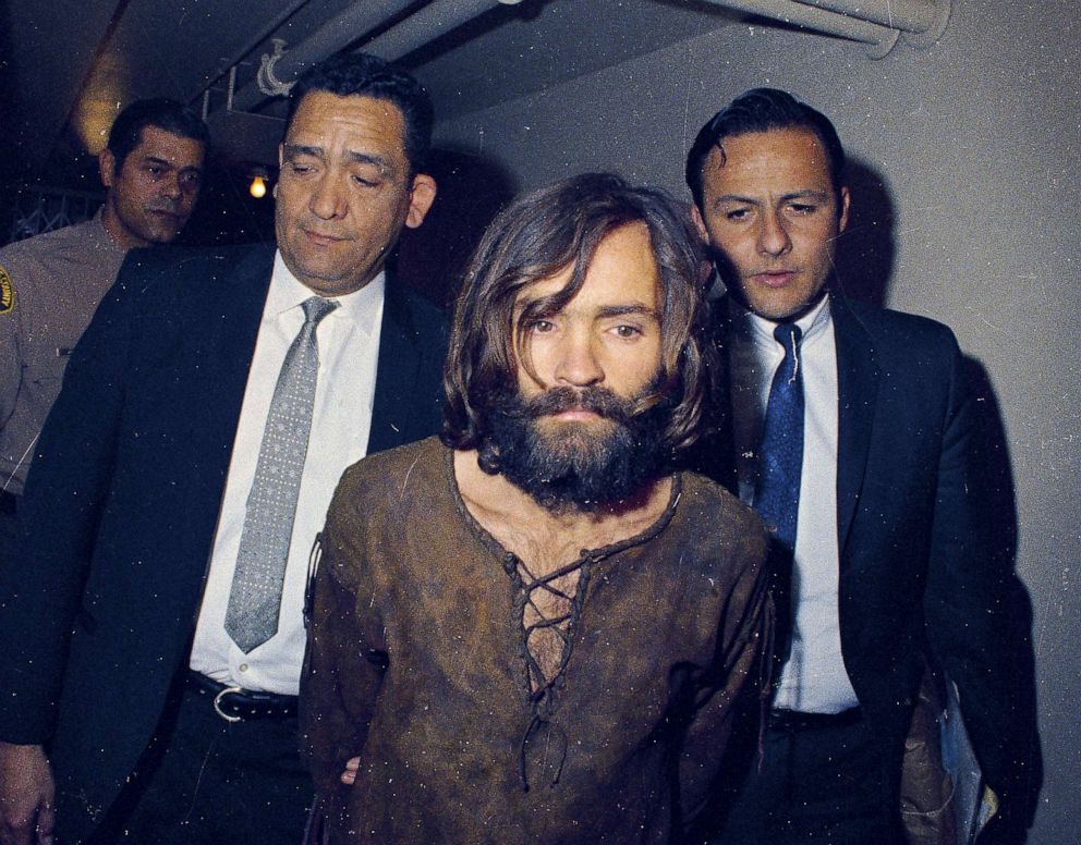 PHOTO: Charles Manson is escorted to his arraignment on conspiracy-murder charges in conneciton with the Sharon Tate murder case, 1969, in Los Angeles.