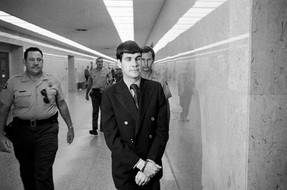 PHOTO: Charles Tex Watson, center, is led back to jail from a courtroom after he was convicted of seven counts of first degree murder and one of conspiracy to commit murder in the Tate-LaBianca slayings, Oct. 12, 1971, Los Angeles.