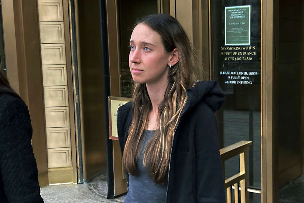 PHOTO: Charlie Javice leaves Manhattan federal court, April 4, 2023, after signing a $2-million bond to remain free on charges that she duped J.P. Morgan Chase with fake records to acquire her student loan assistance startup company, for $175-million.