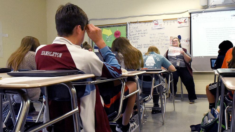 PHOTO: In this Dec. 3, 2018, file photo, shows a teacher speaking to her English One students in class at Hopewell High School in Charlotte, N.C.