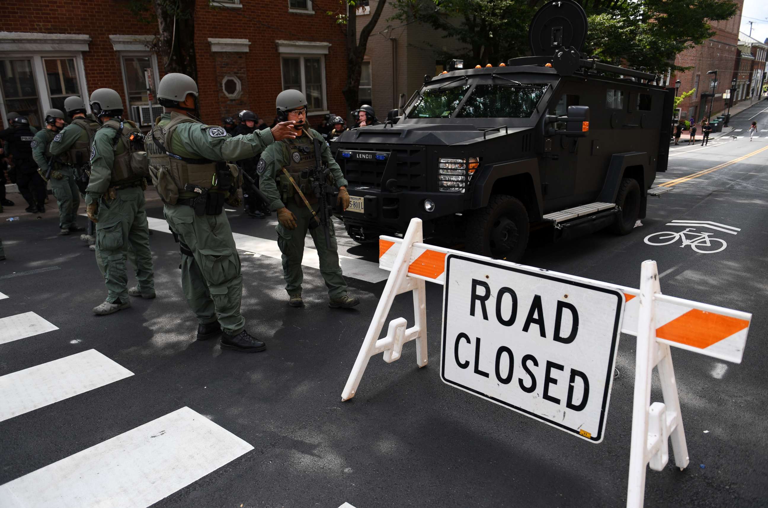PHOTO: Police stand guard near the rally site in Charlottesville, Va., Aug. 12, 2017. At least one person was killed in a multiple car crash following a violent white nationalist rally said Charlottesville Mayor Michael Signer. 