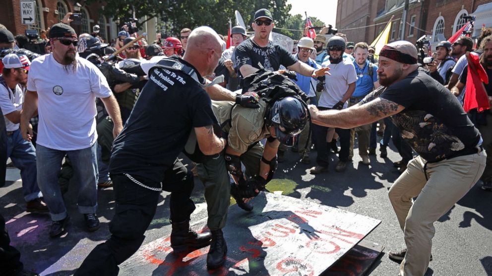 PHOTO: White nationalists, neo-Nazis, the KKK and members of the "alt-right" clash with counter-protesters outside Emancipation Park during the Unite the Right rally Aug. 12, 2017 in Charlottesville, Va.