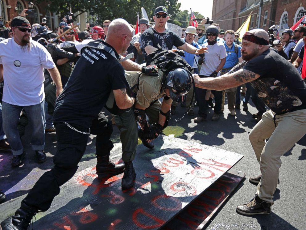 PHOTO: White nationalists, neo-Nazis, the KKK and members of the alt-right clash with counter-protesters outside Emancipation Park during the Unite the Right rally Aug. 12, 2017 in Charlottesville, Va.
