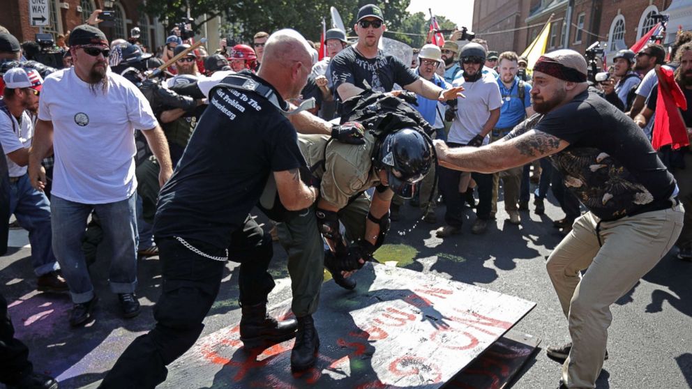 PHOTO: White nationalists, neo-Nazis, the KKK and members of the "alt-right" clash with counter-protesters outside Emancipation Park during the Unite the Right rally Aug. 12, 2017 in Charlottesville, Va.