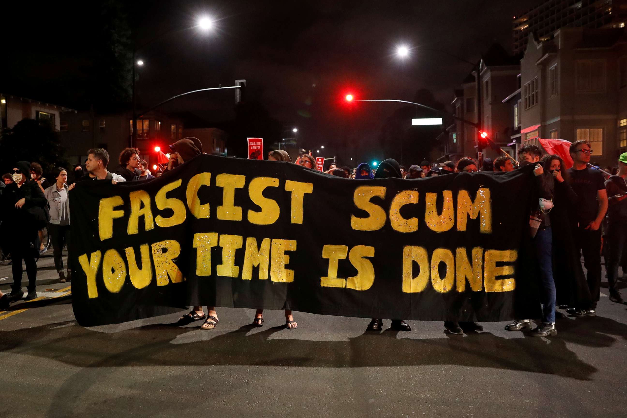 PHOTO: Demonstrators march in response in response to the Charlottesville, Virginia car attack on counter-protesters after the Unite the Right rally organized by white nationalists, in Oakland, Calif., Aug. 12, 2017. 