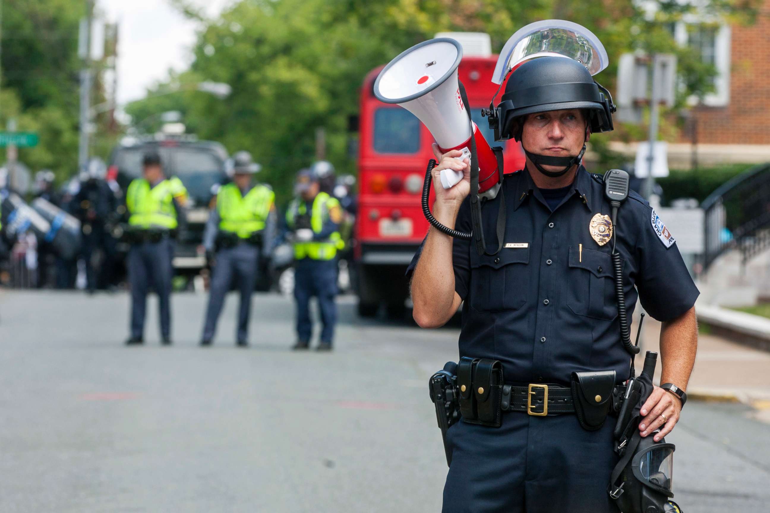 PHOTO: A police officer stands in the middle of the street after declaring the protest an unlawful assembly during a white nationalist rally, Aug. 12, 2017, in Charlottesville, Va.