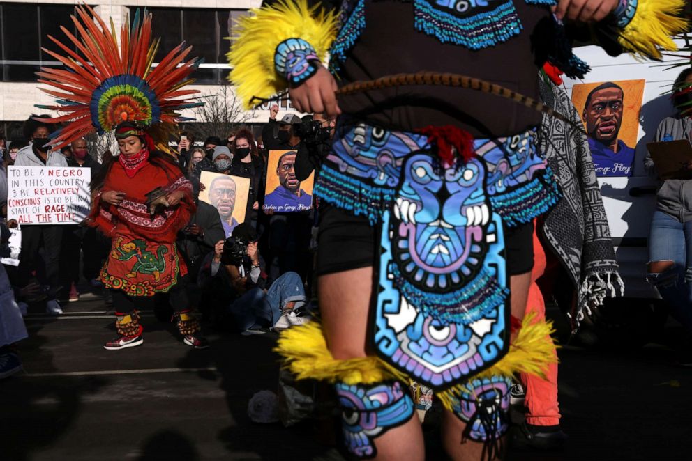 PHOTO: Indigenous people perform during a rally outside the Hennepin County Government Center on the first day of the trial of former Minneapolis police officer Derek Chauvin, on murder charges in the death of George Floyd in Minneapolis, March 8, 2021.